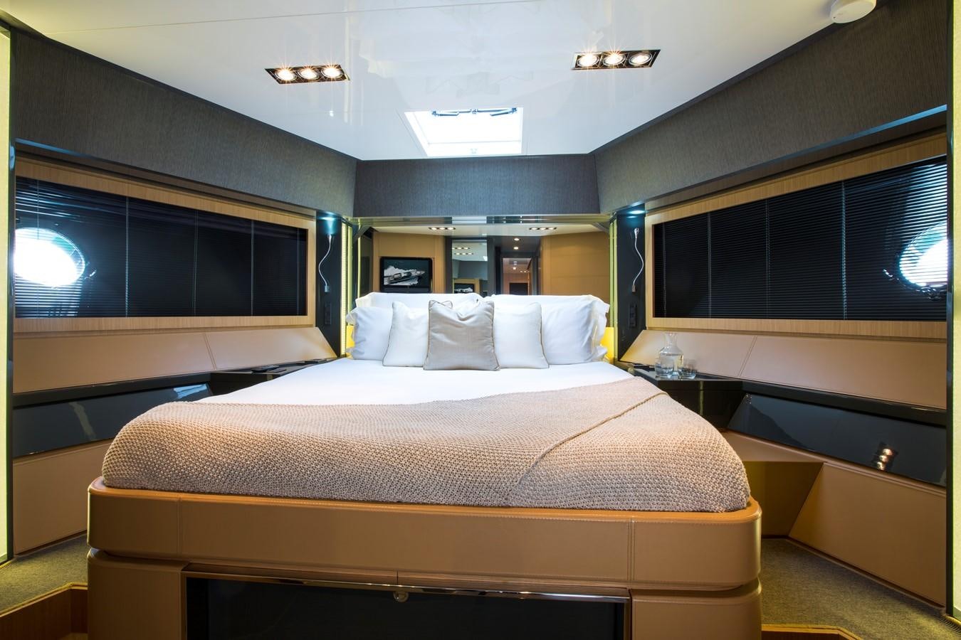 a bed in a room aboard RHINO A Yacht for Sale