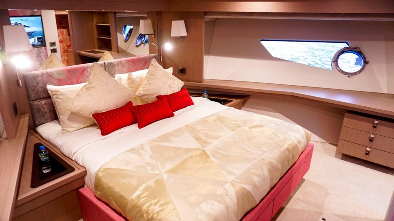 a bed with pillows and a pillow aboard SKYE Yacht for Sale