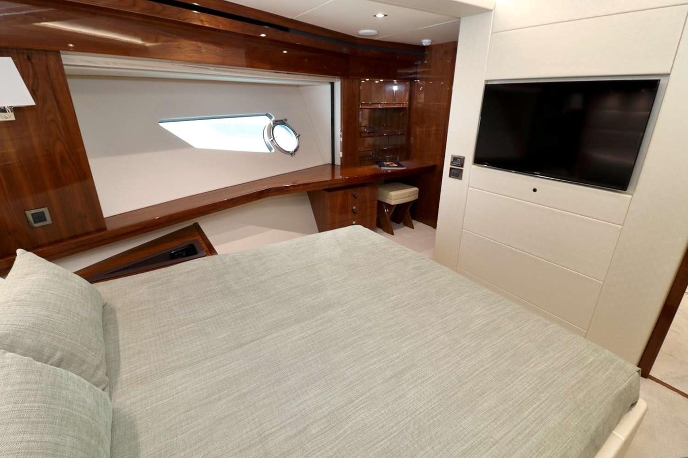 a bed in a room aboard SUNSEEKER 86 Yacht for Sale