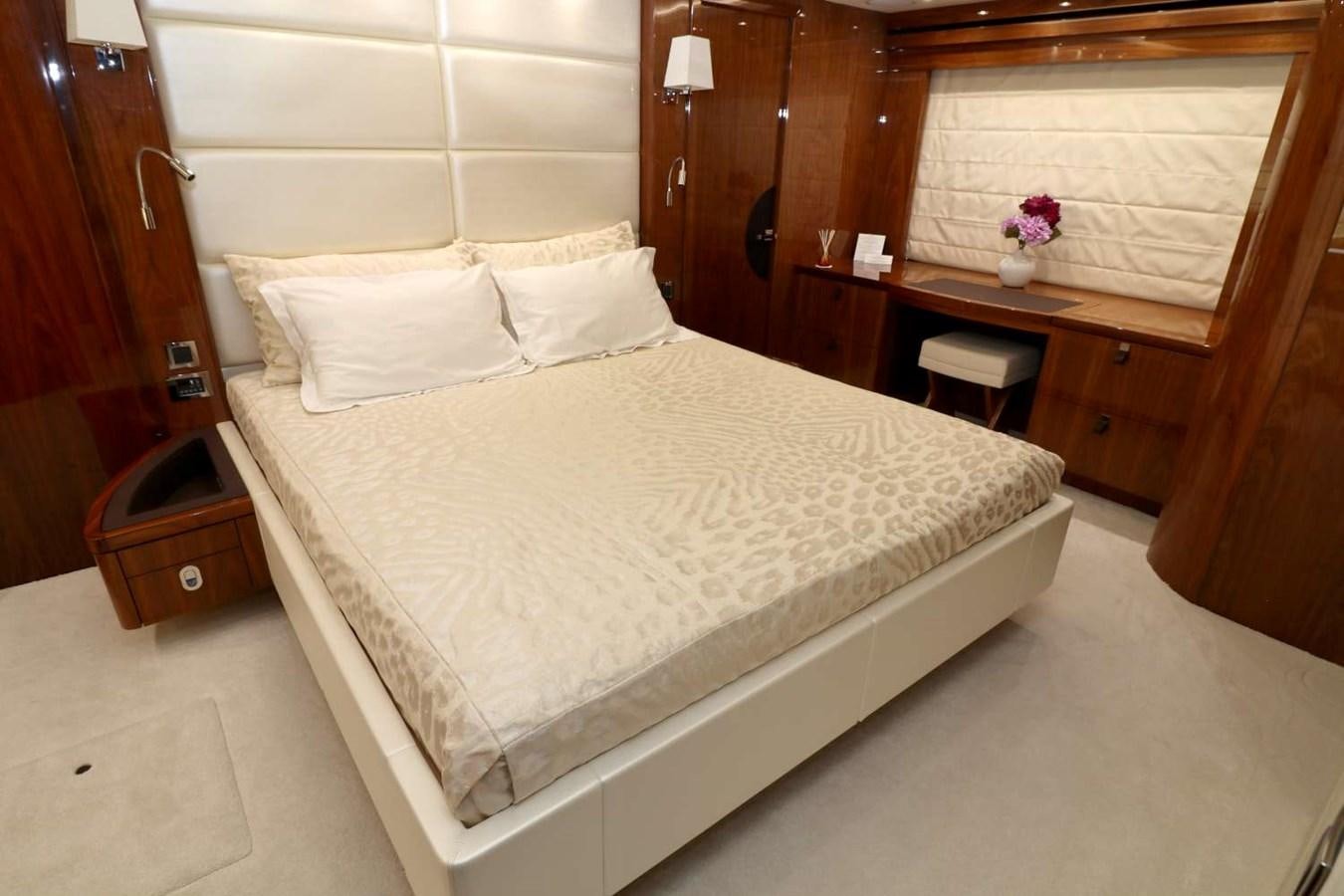 a bed in a room aboard SUNSEEKER 86 Yacht for Sale