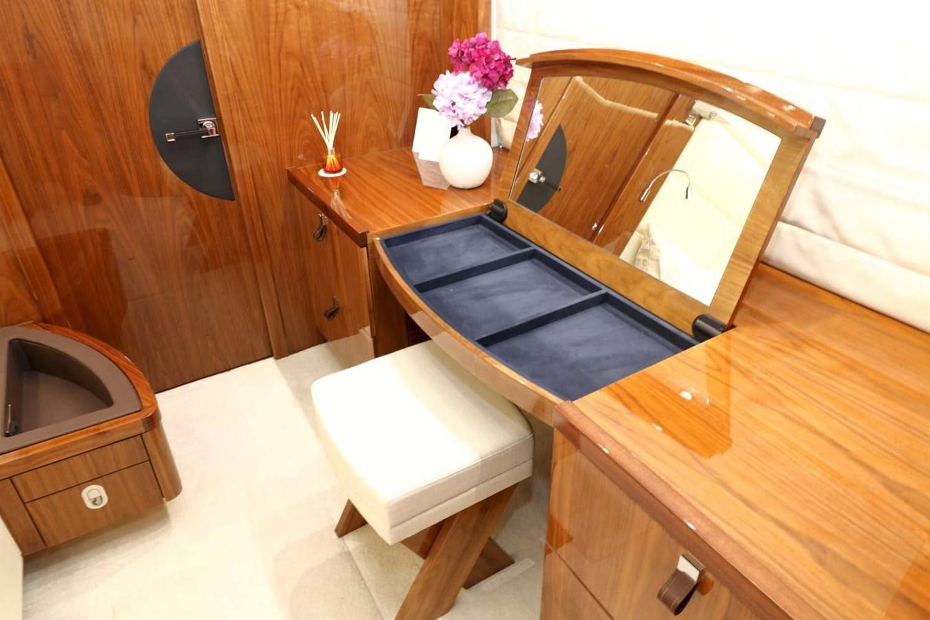 a bathroom with a large mirror aboard SUNSEEKER 86 Yacht for Sale