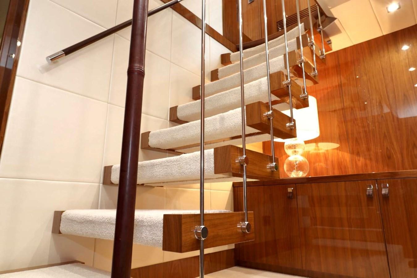 a staircase with lights aboard SUNSEEKER 86 Yacht for Sale