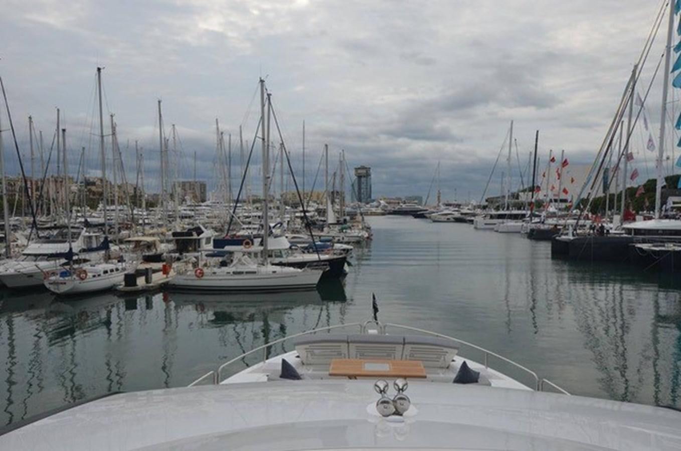 boats in a harbor aboard SUNSEEKER 86 Yacht for Sale