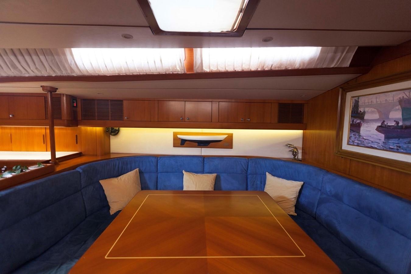 a room with a couch and a table aboard DREAMLAND Yacht for Sale