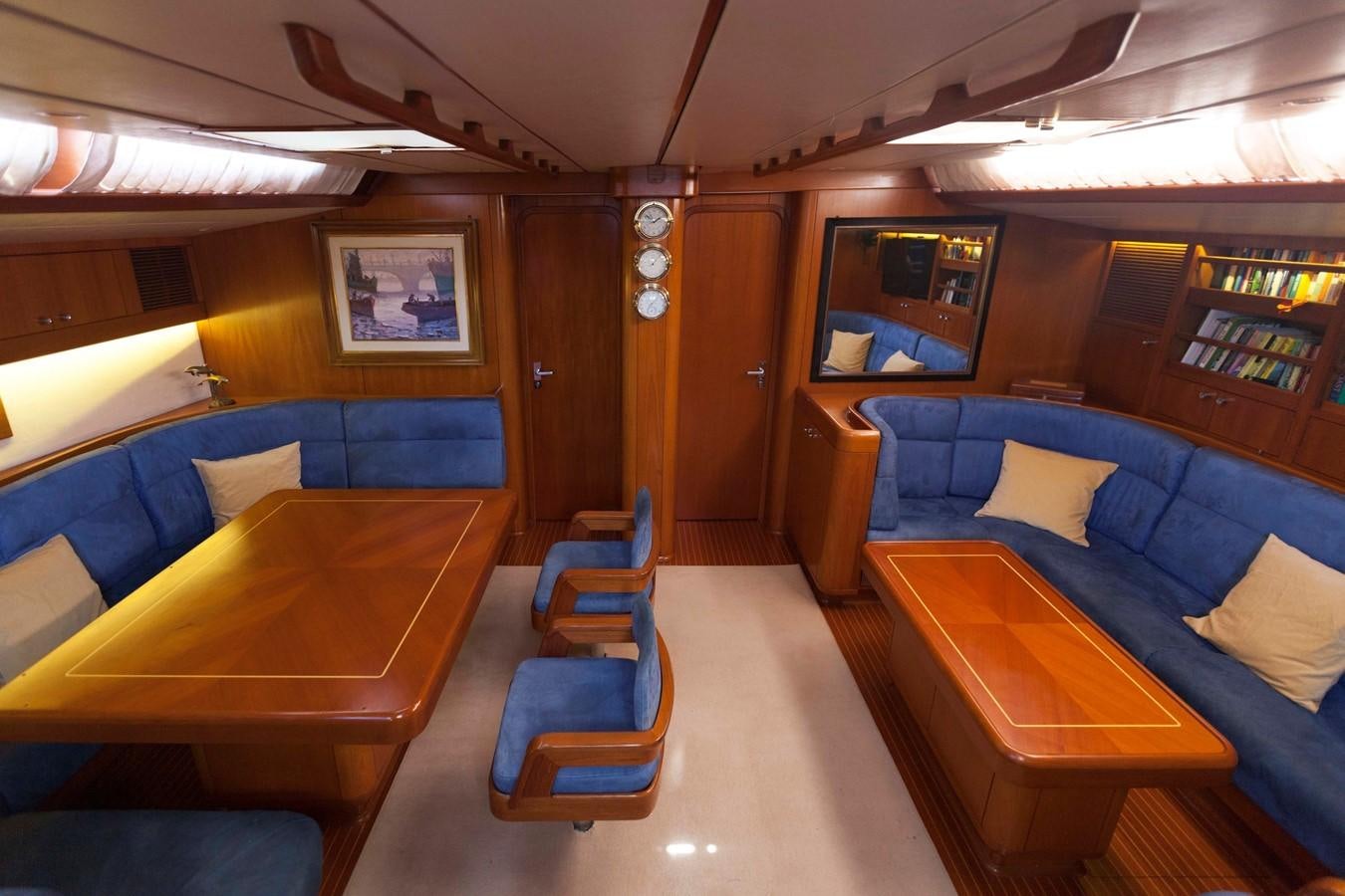 a room with a couch and a table aboard DREAMLAND Yacht for Sale
