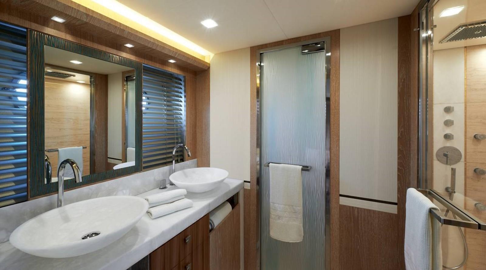 a bathroom with a sink and a shower aboard MONTE CARLO YACHTS MCY 86 Yacht for Sale