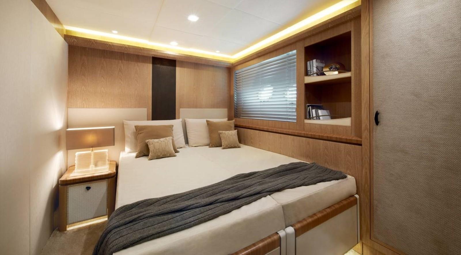 a bed with white sheets aboard MONTE CARLO YACHTS MCY 86 Yacht for Sale