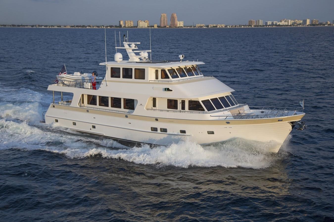 a large white boat on the water aboard 860 DBMY Yacht for Sale