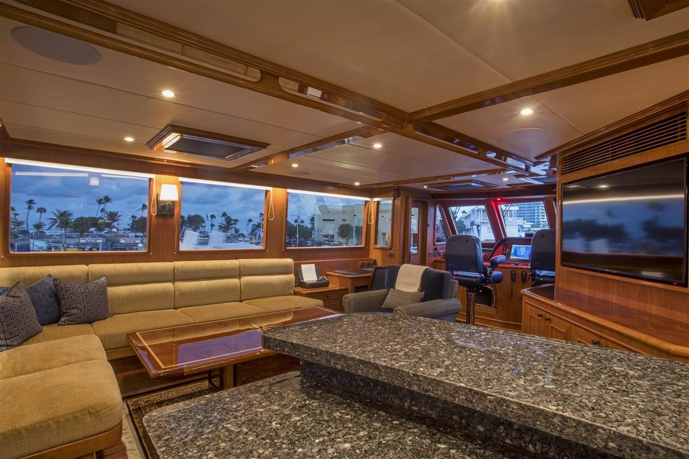 a living room with a large bed aboard 860 DBMY Yacht for Sale