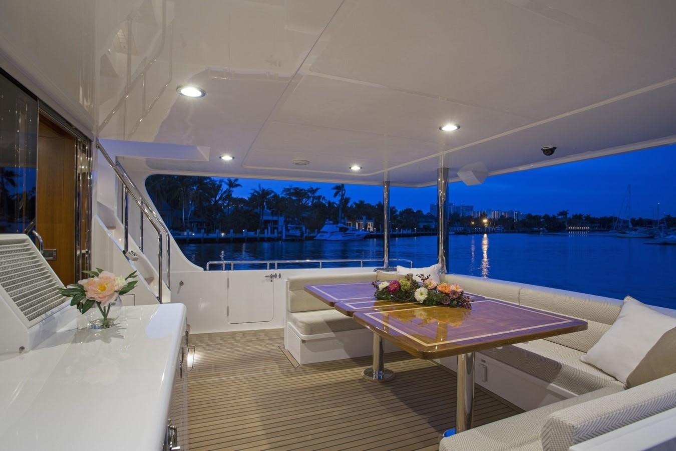 a room with a table and chairs aboard 860 DBMY Yacht for Sale