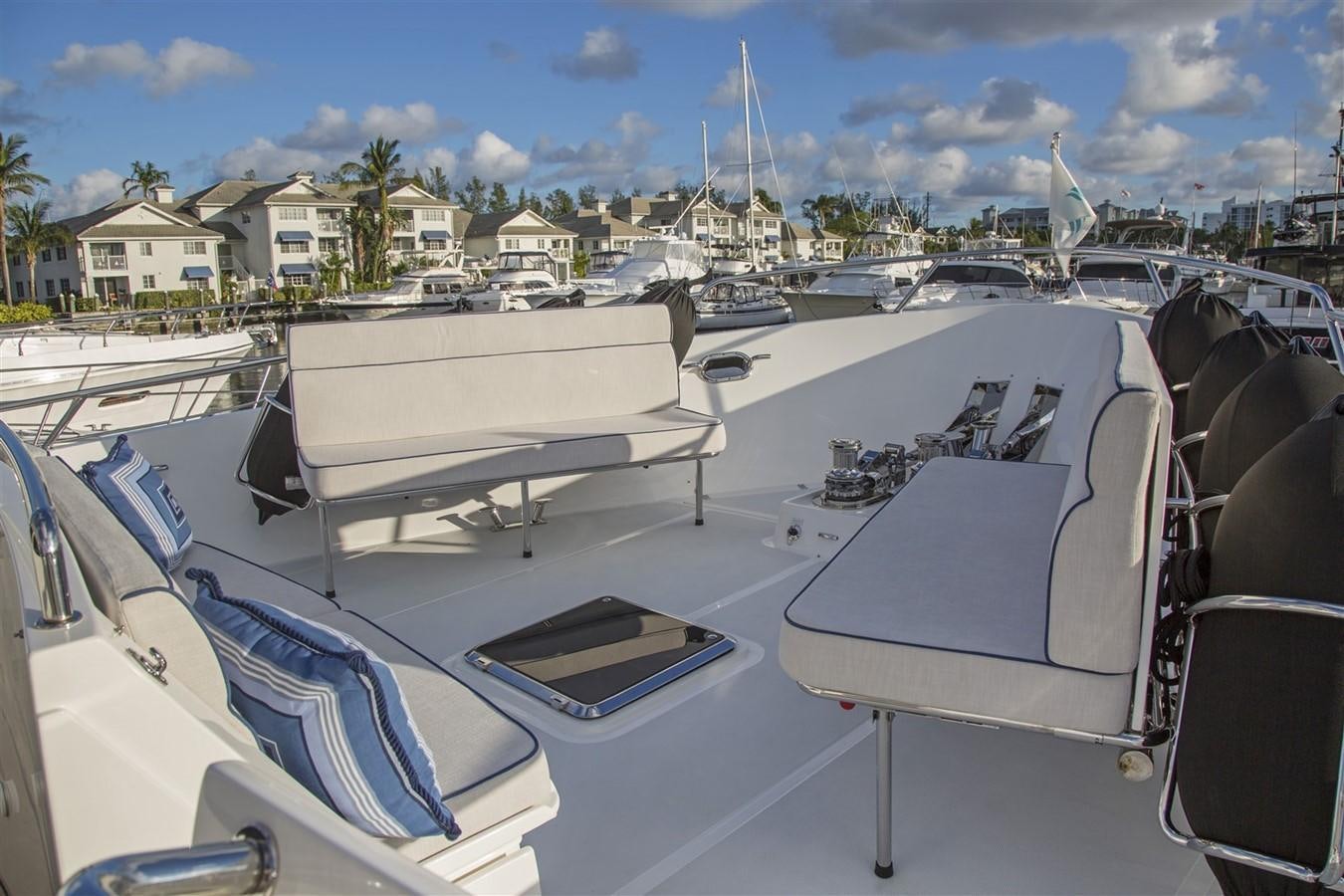 a group of boats in a harbor aboard 860 DBMY Yacht for Sale