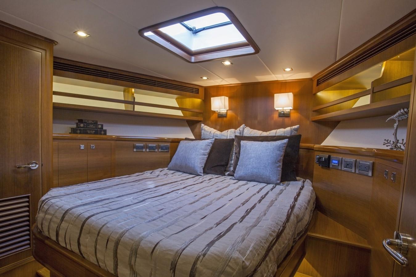 a bed in a room aboard 860 DBMY Yacht for Sale