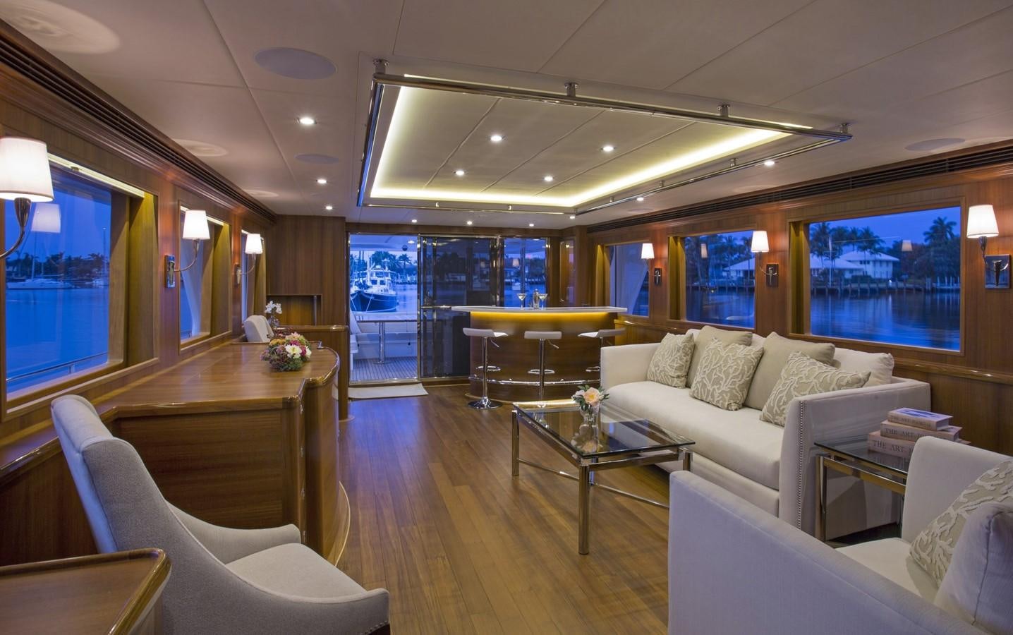a living room with a large window aboard 860 DBMY Yacht for Sale