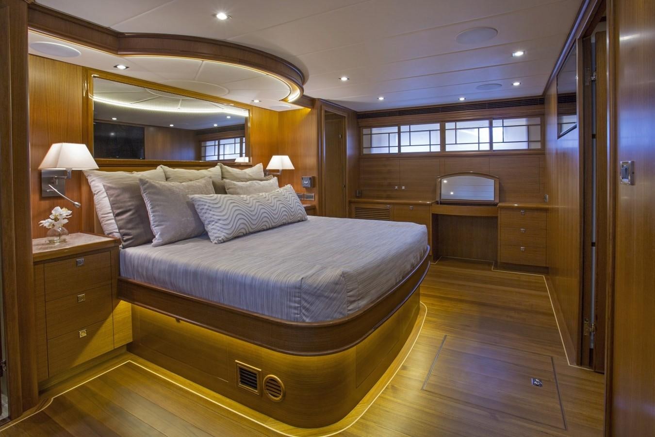 a large bed in a room aboard 860 DBMY Yacht for Sale