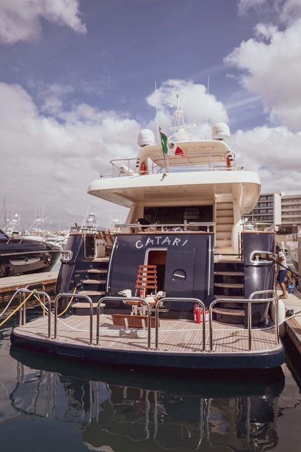 a boat docked at a pier aboard CATARI Yacht for Sale