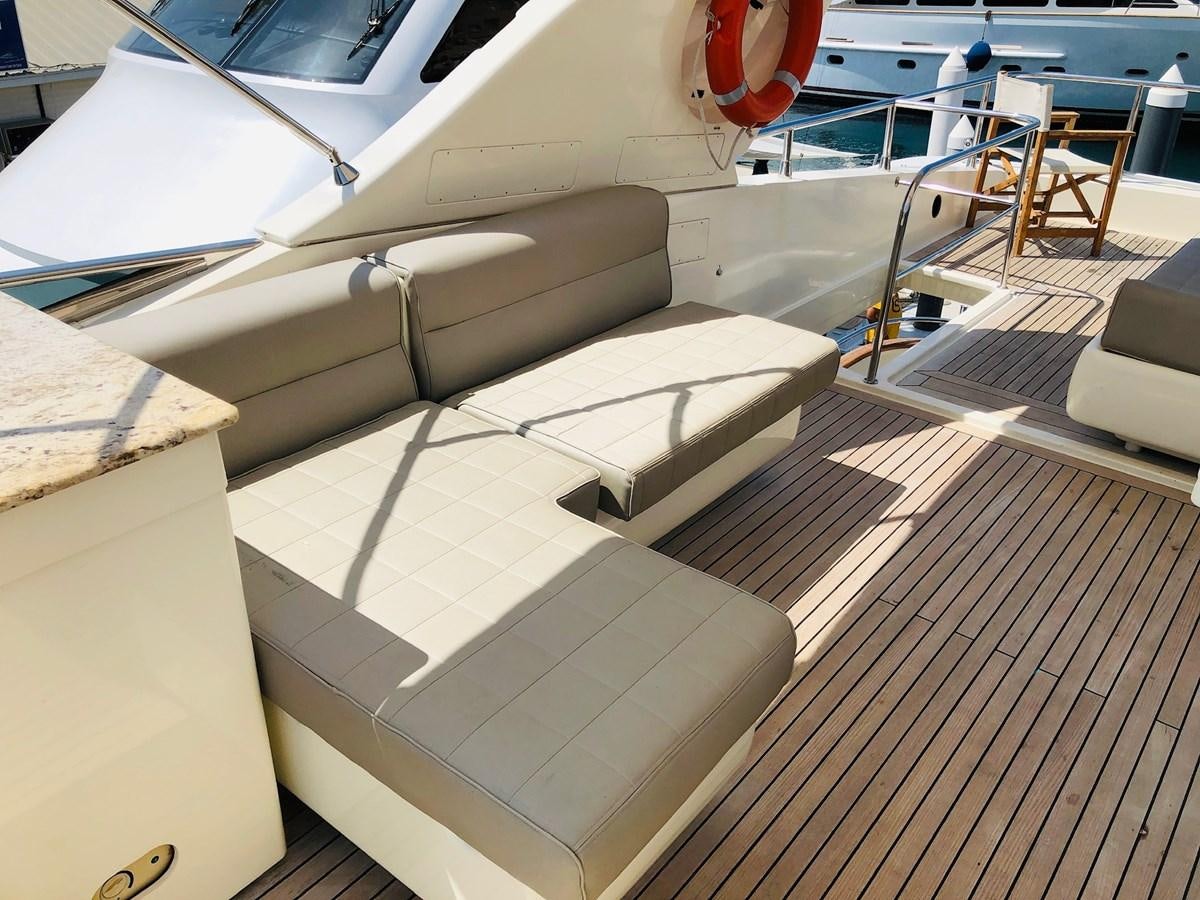 a boat with a bench aboard CATARI Yacht for Sale