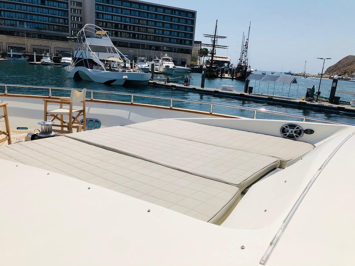 a boat docked at a pier aboard CATARI Yacht for Sale