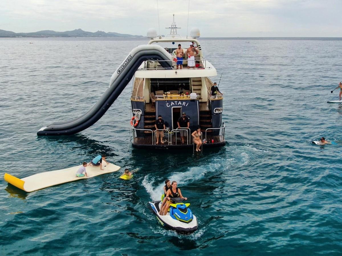 a group of people on a boat aboard CATARI Yacht for Sale