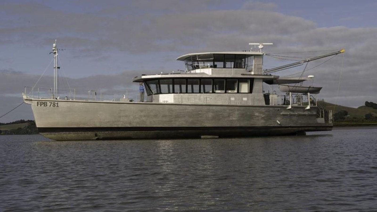 a large ship in the water aboard IRON LADY II Yacht for Sale