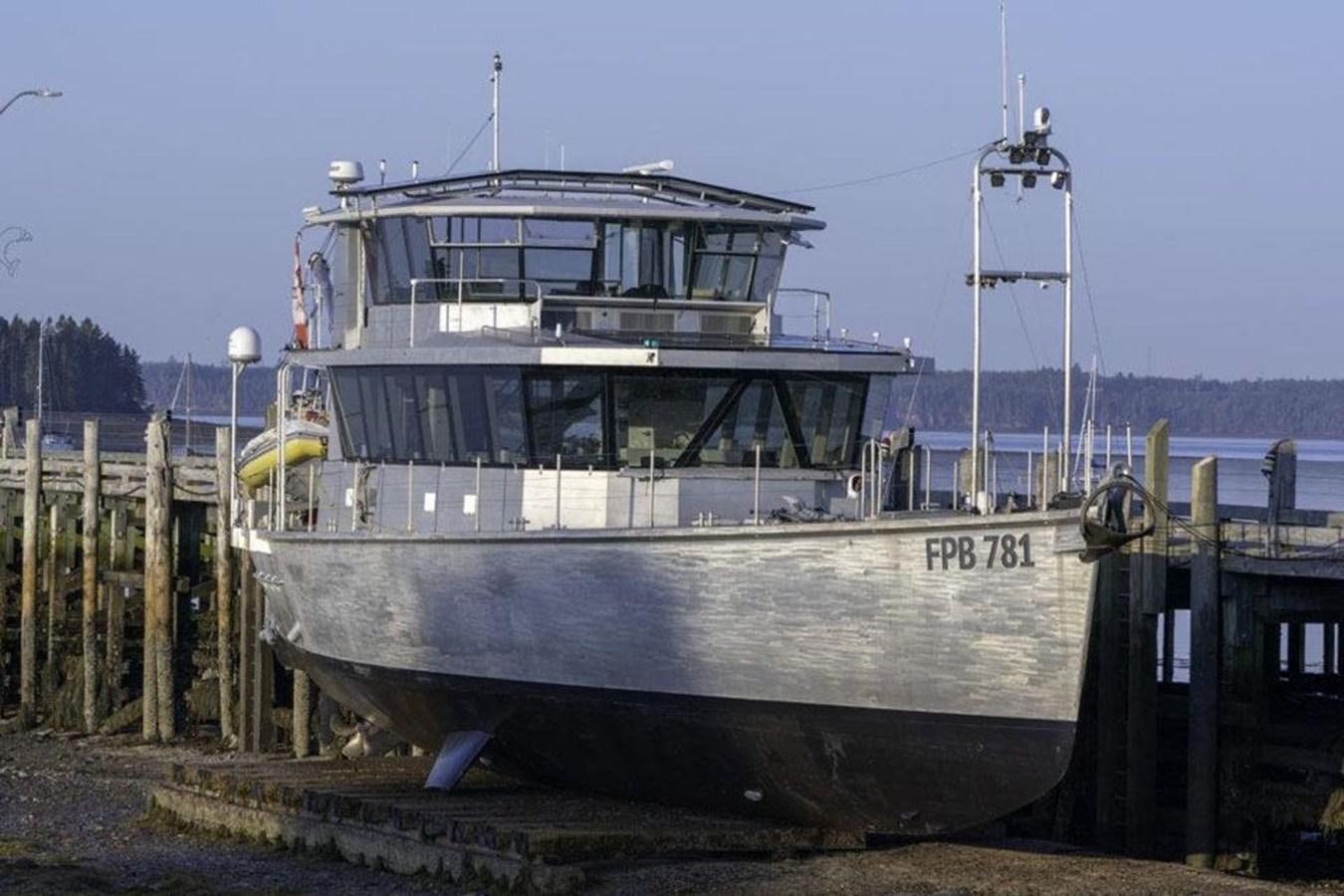 a boat on a dock aboard IRON LADY II Yacht for Sale