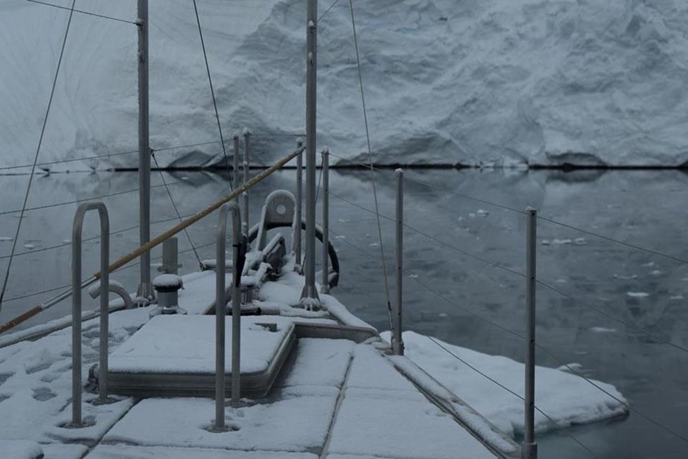 a snowy area with a railing and a railing with a railing and a railing with a snow covered aboard IRON LADY II Yacht for Sale