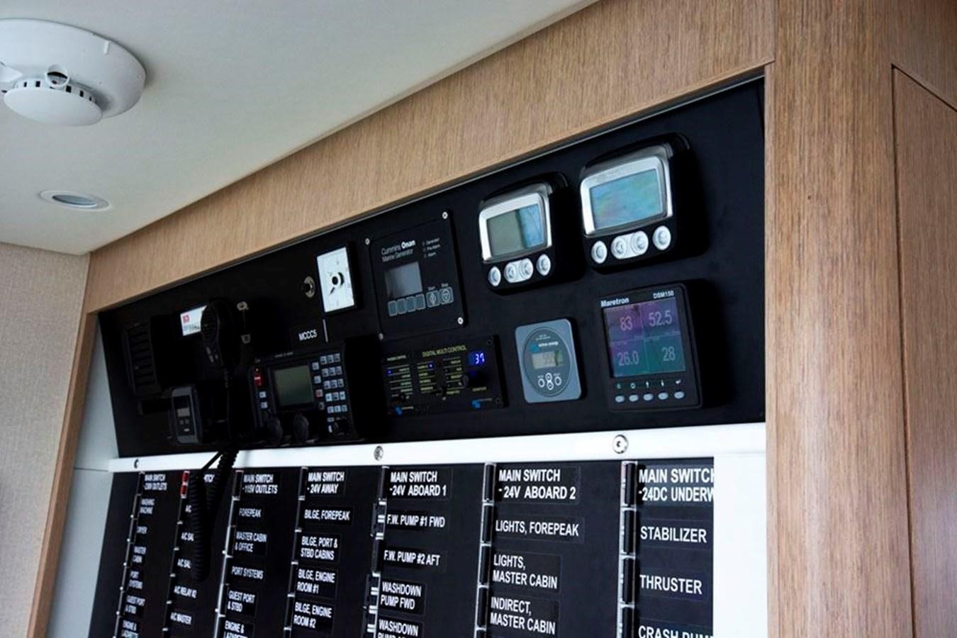 a black electronic device aboard IRON LADY II Yacht for Sale