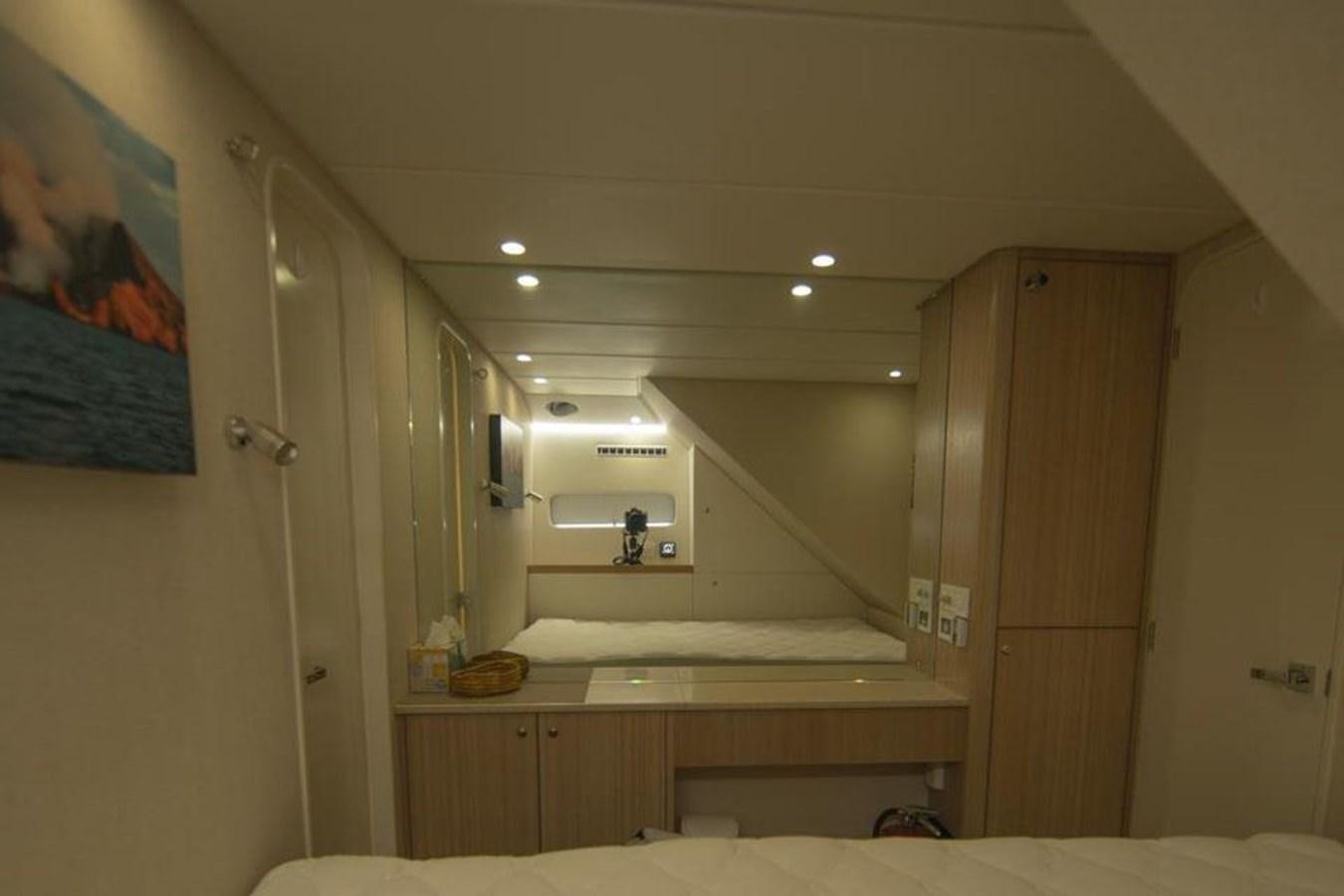 a bathroom with a large white counter aboard IRON LADY II Yacht for Sale