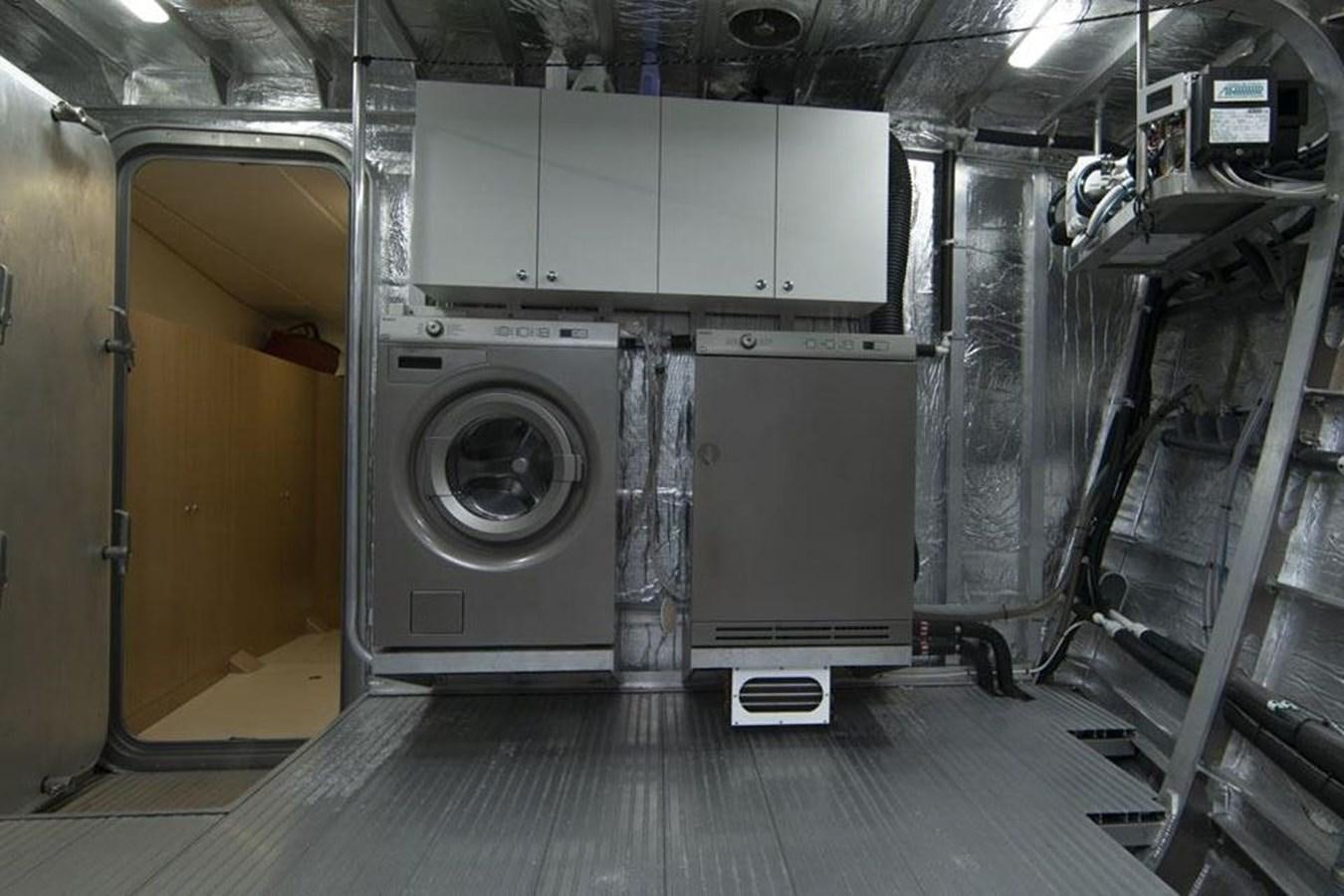 a large room with machines aboard IRON LADY II Yacht for Sale