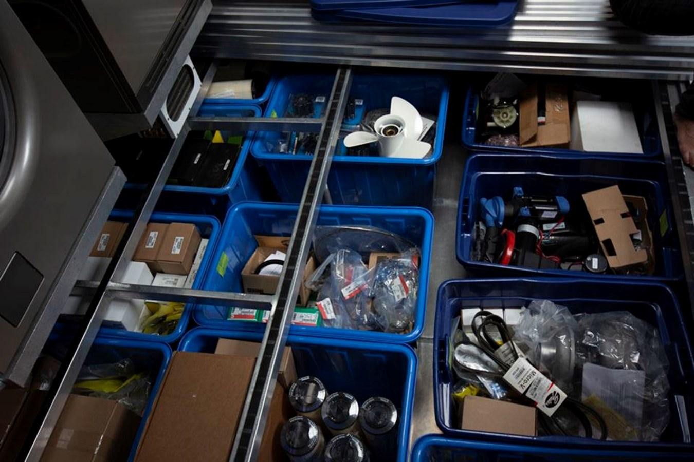 a blue bin full of garbage aboard IRON LADY II Yacht for Sale