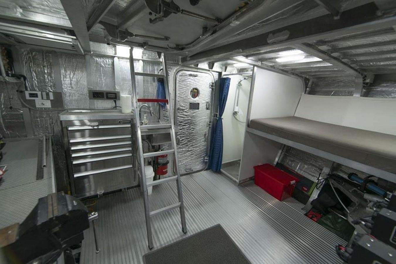 a room with machines and equipment aboard IRON LADY II Yacht for Sale