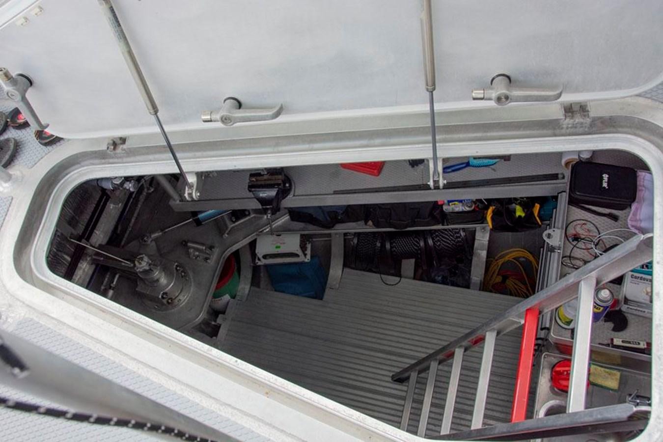 a white car with a red stripe aboard IRON LADY II Yacht for Sale