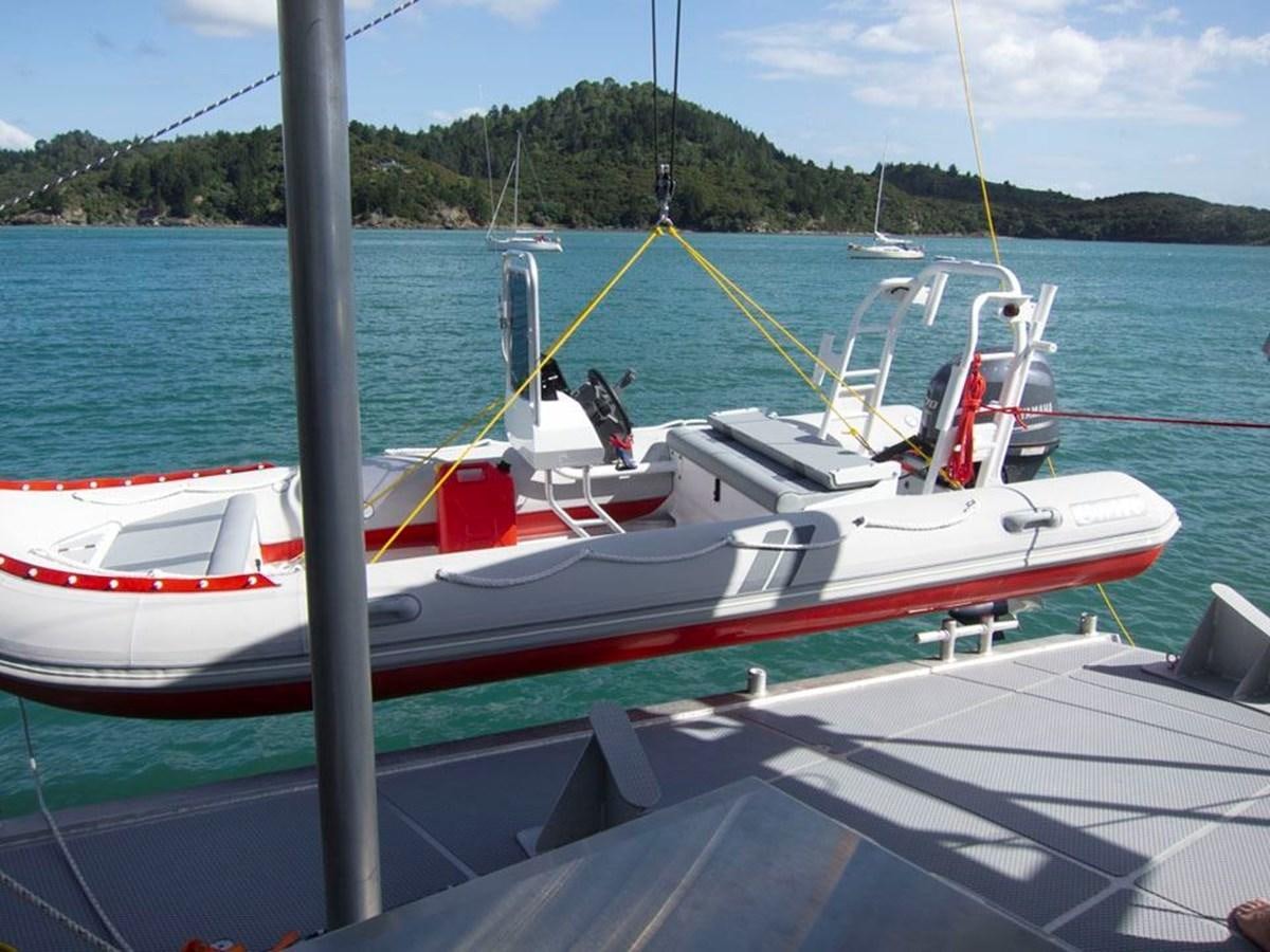a boat docked at a pier aboard IRON LADY II Yacht for Sale
