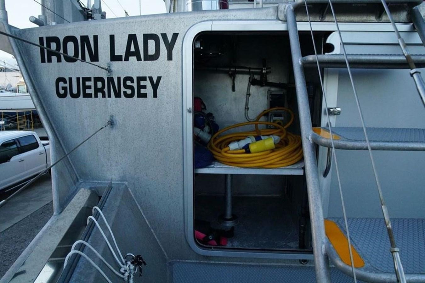a boat with a yellow object on the front aboard IRON LADY II Yacht for Sale