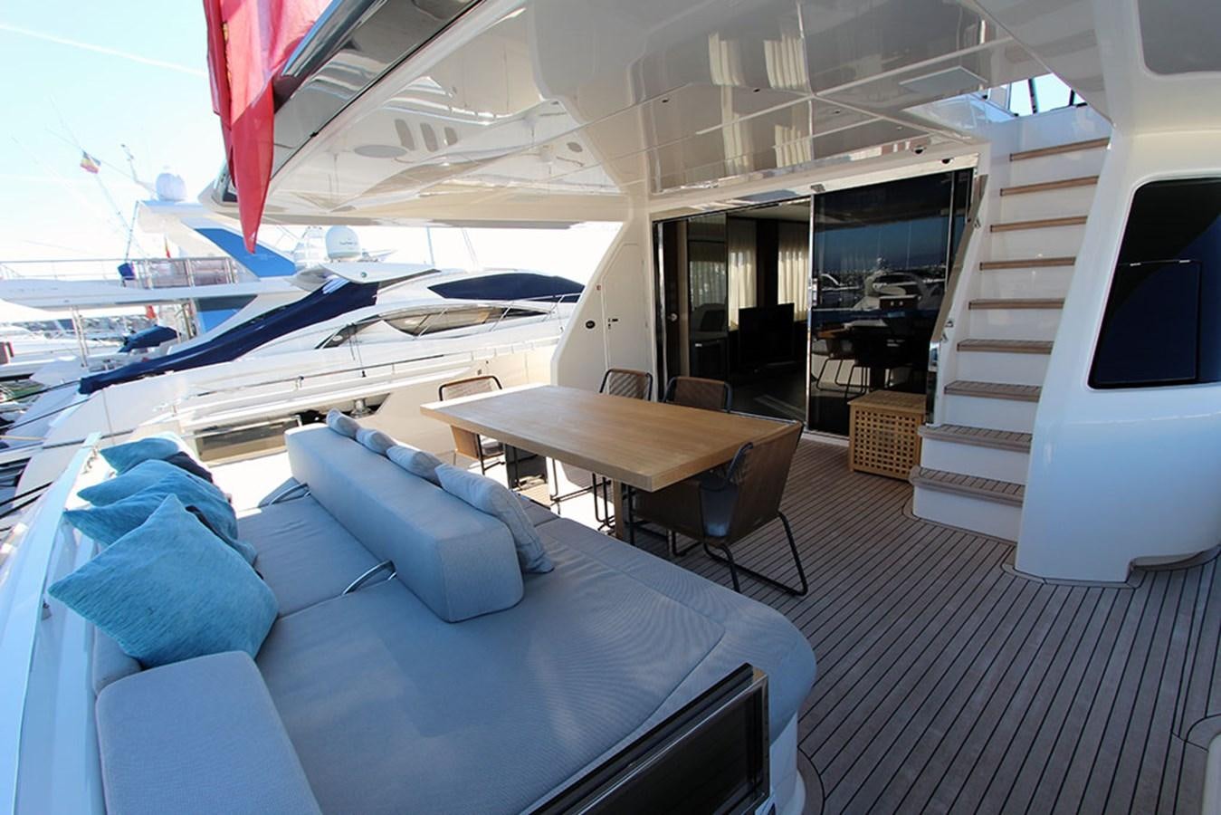 a room with a bed and a desk aboard ANASSA A Yacht for Sale