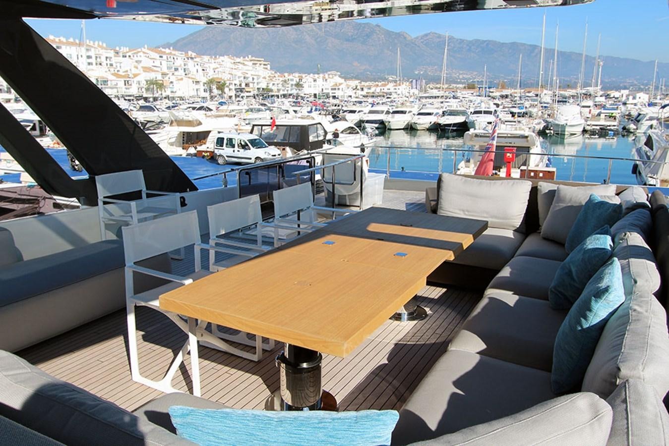 a table on a boat aboard ANASSA A Yacht for Sale