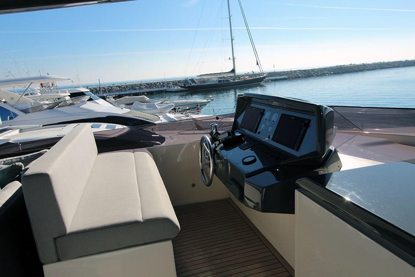a boat with a laptop on it aboard ANASSA A Yacht for Sale