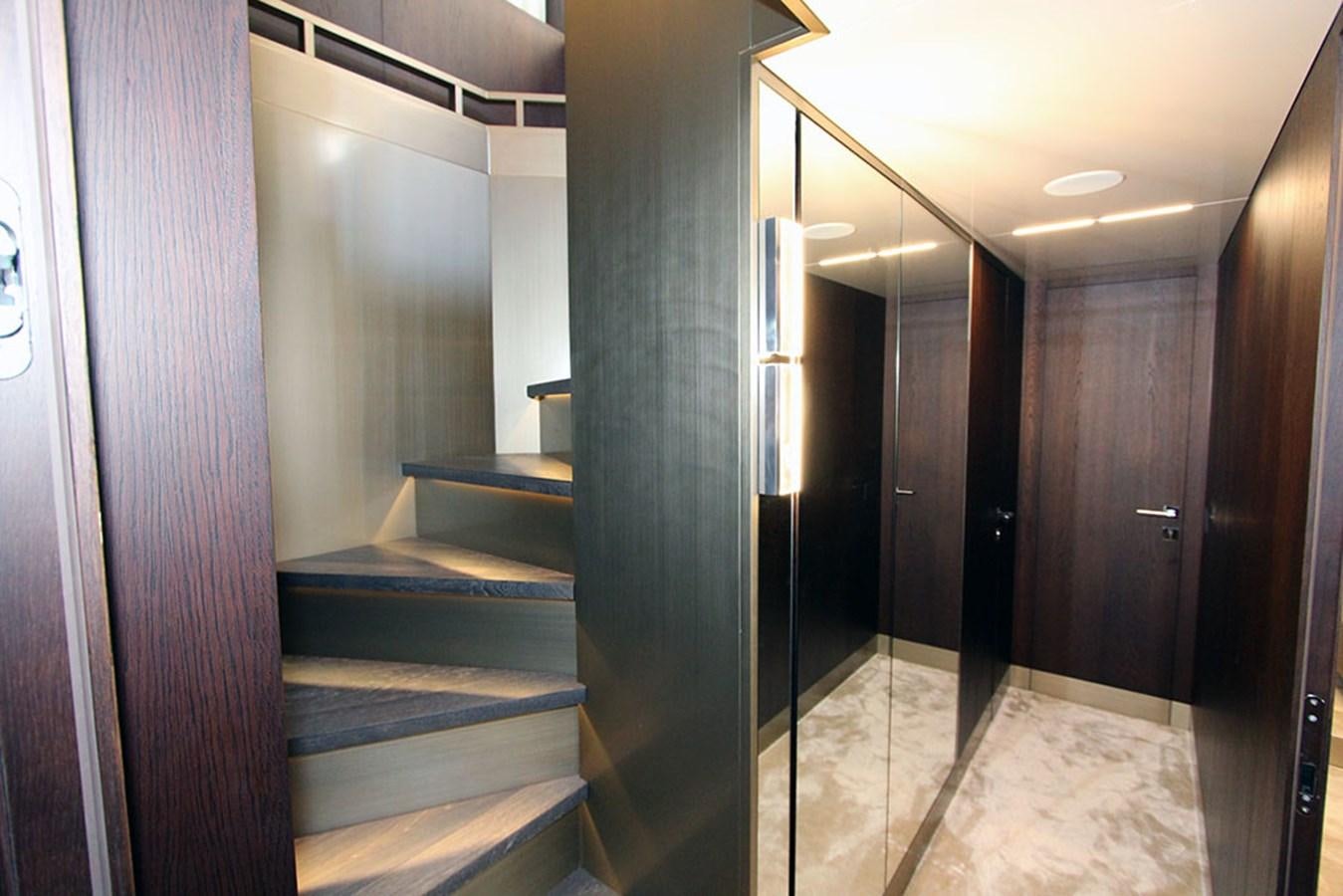 a hallway with doors aboard ANASSA A Yacht for Sale