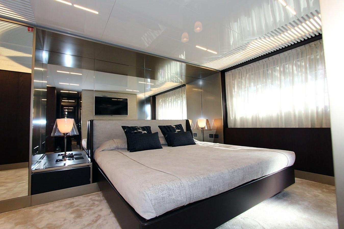 a large bed in a room aboard ANASSA A Yacht for Sale