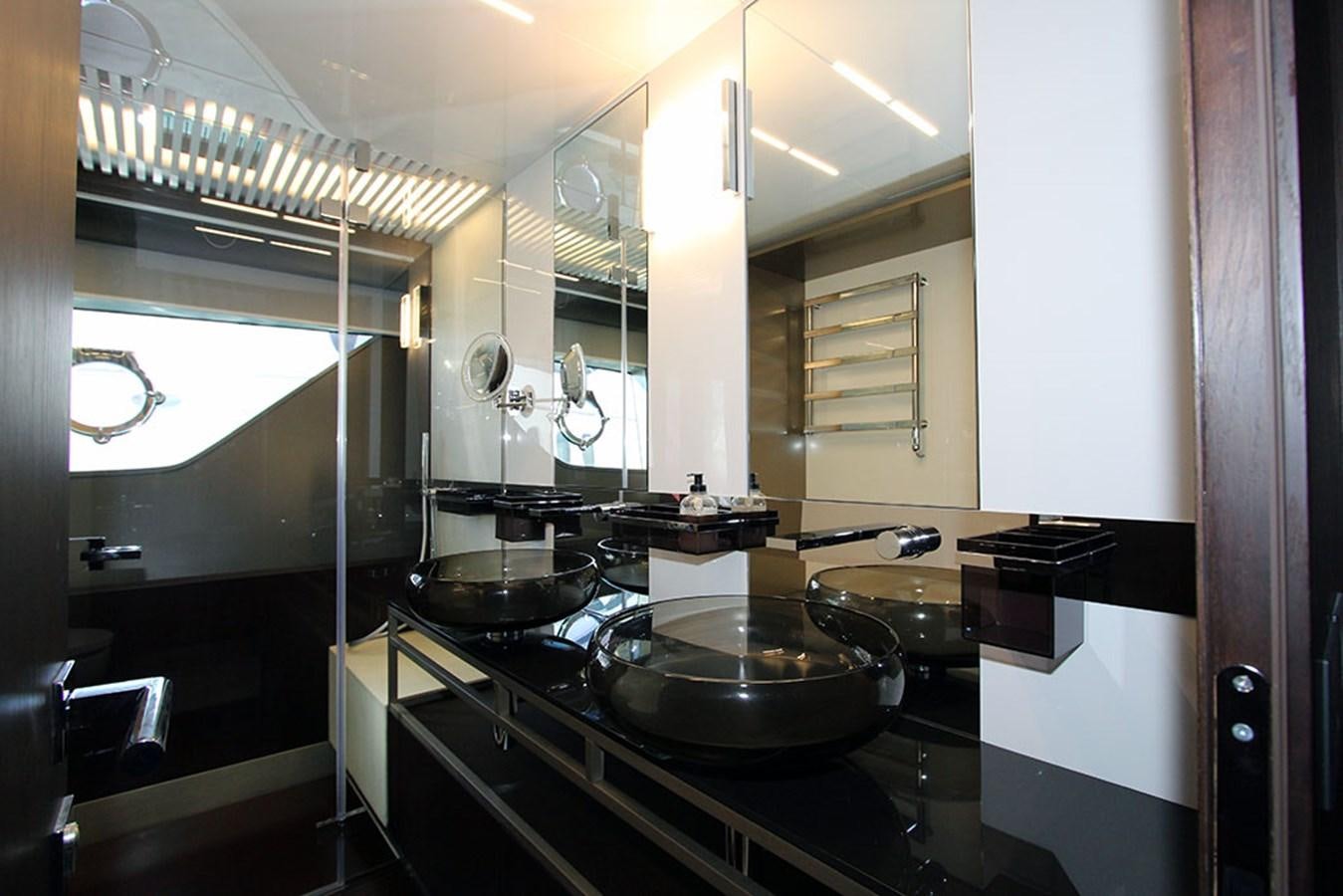 a kitchen with sinks and mirrors aboard ANASSA A Yacht for Sale