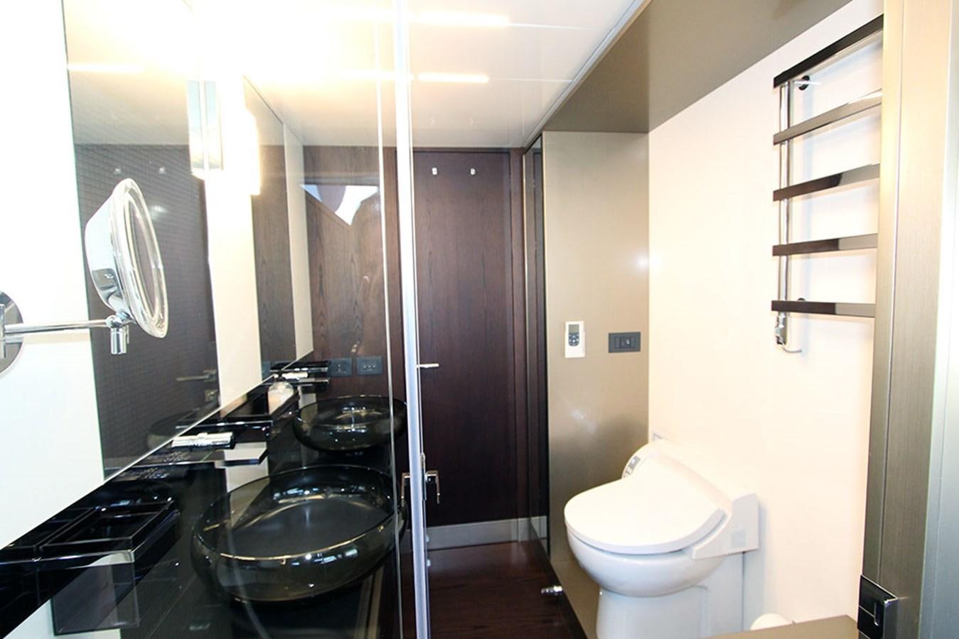 a bathroom with a sink and a toilet aboard ANASSA A Yacht for Sale