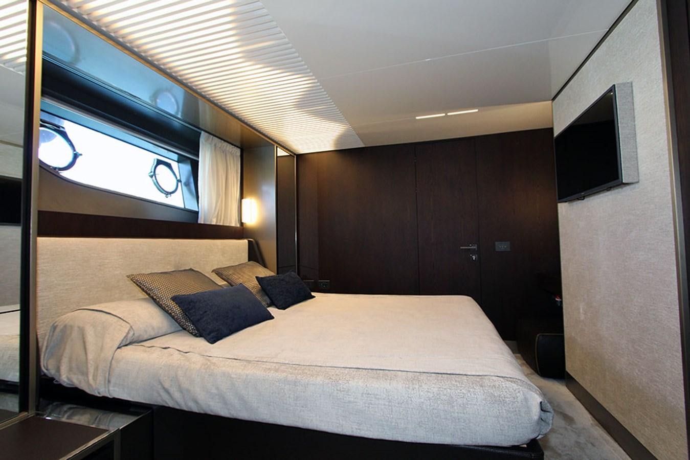 a bed in a room aboard ANASSA A Yacht for Sale