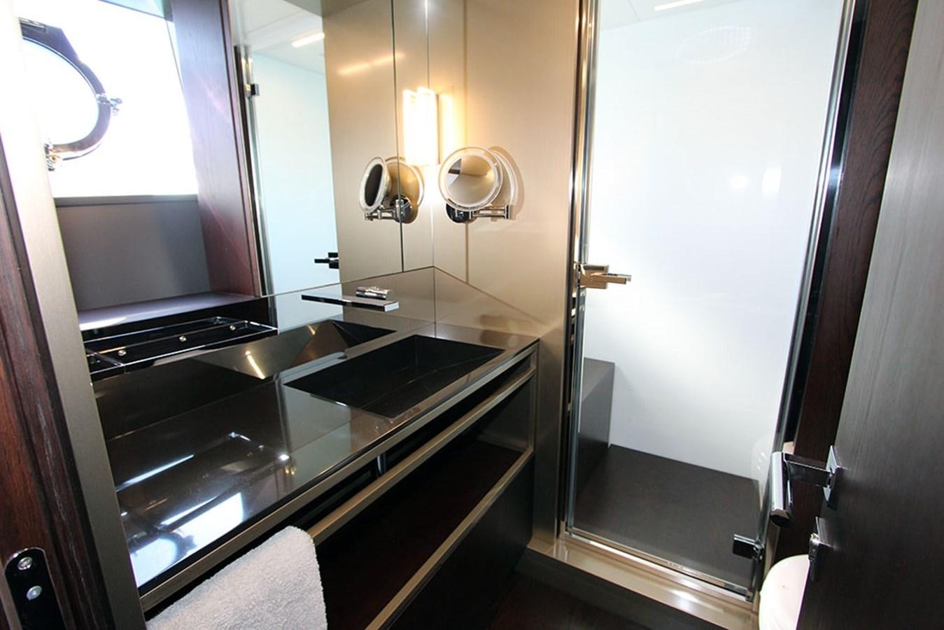 a bathroom with a sink and a mirror aboard ANASSA A Yacht for Sale