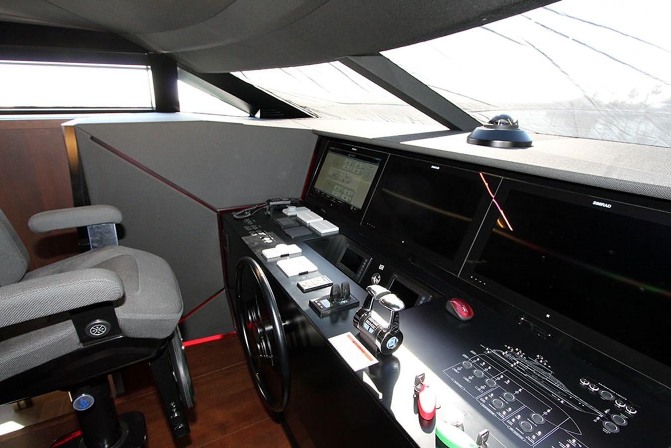 a room with a desk and computer aboard ANASSA A Yacht for Sale