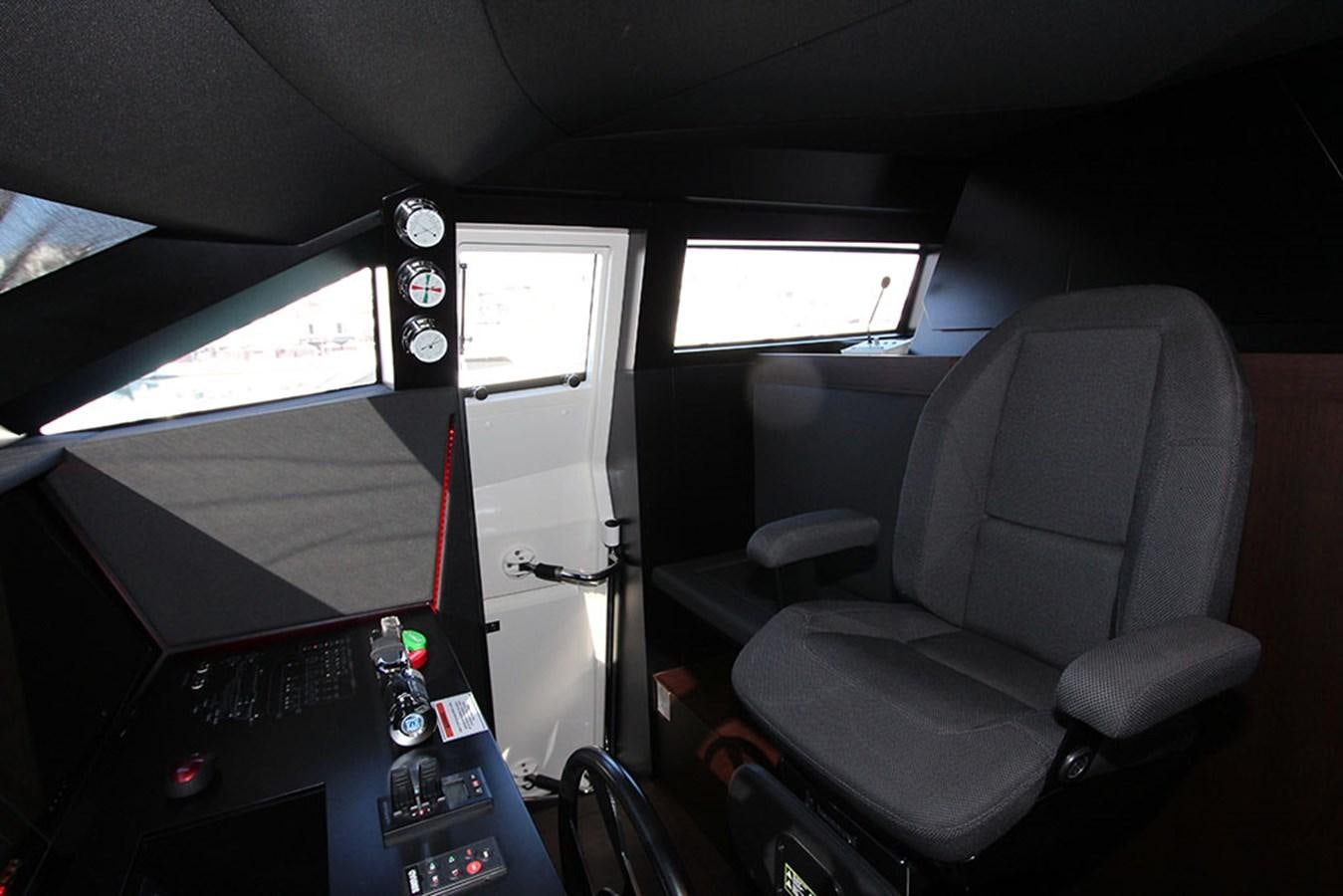 a vehicle with a screen and a computer on it aboard ANASSA A Yacht for Sale