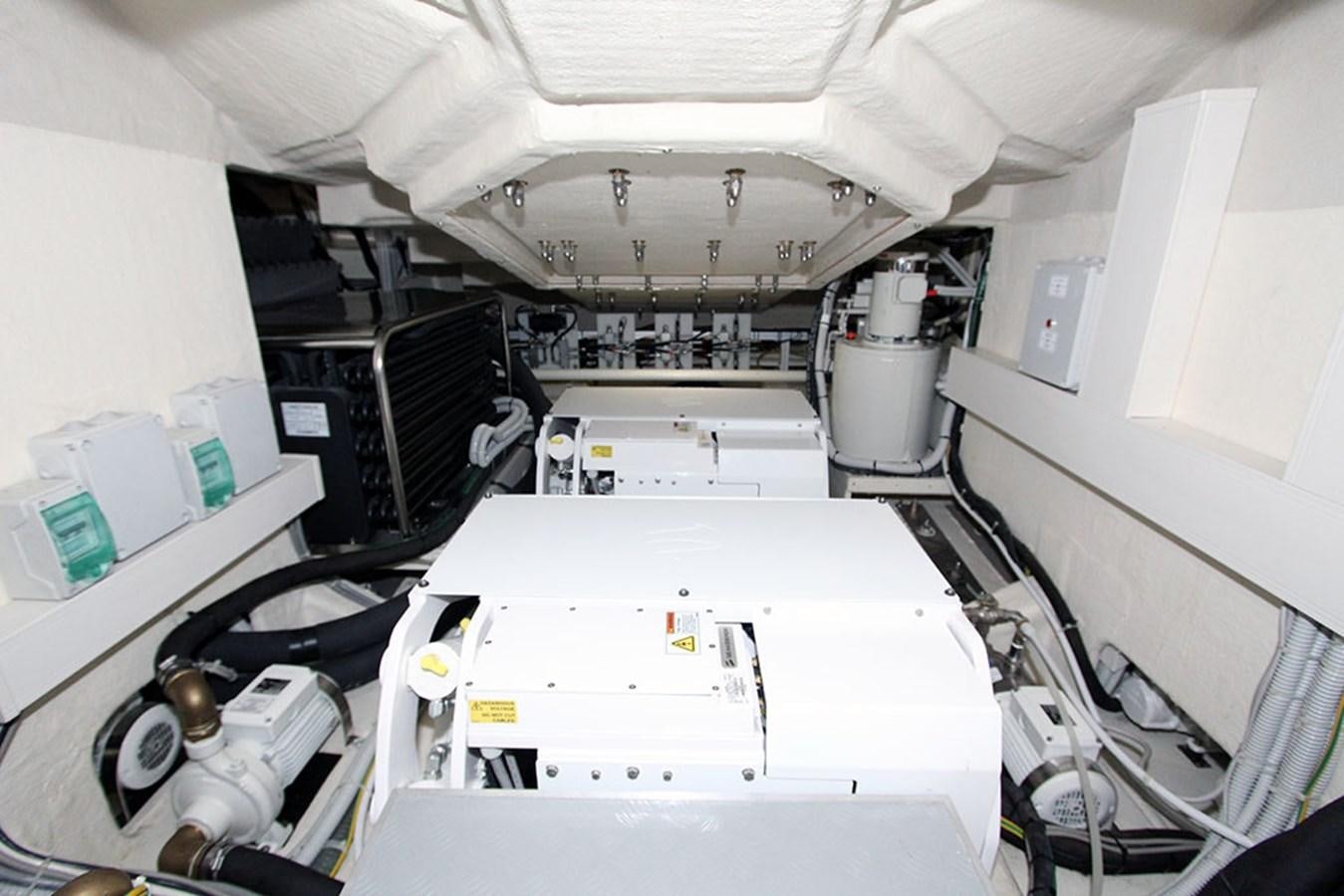 a white machine in a room aboard ANASSA A Yacht for Sale