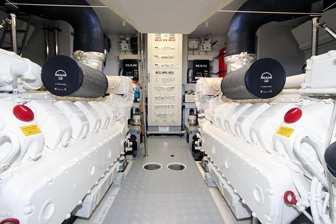 a room with white machines aboard ANASSA A Yacht for Sale