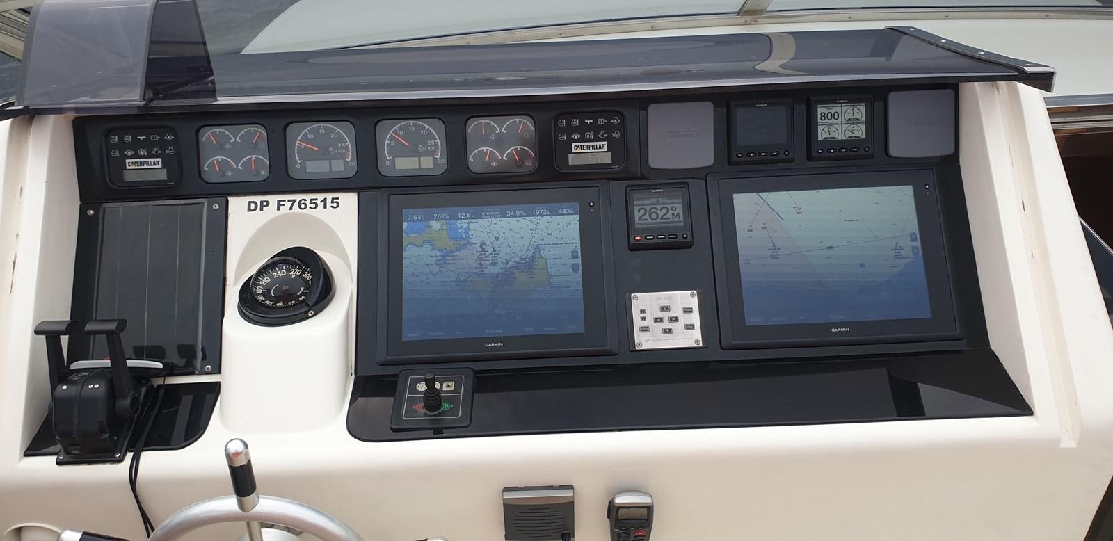 a black electronic device aboard BARON B Yacht for Sale