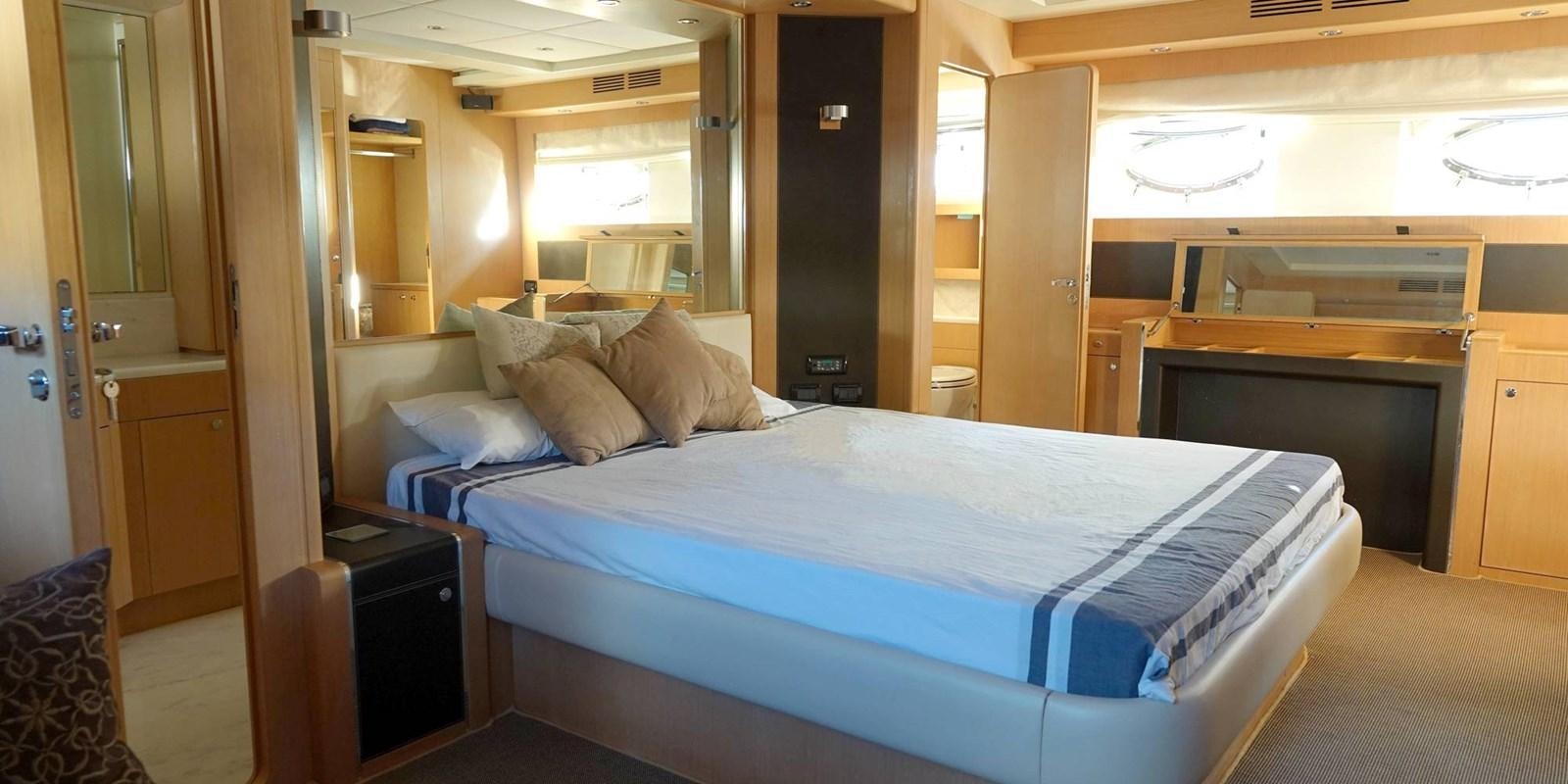 a bed in a room aboard 4 FIVE Yacht for Sale