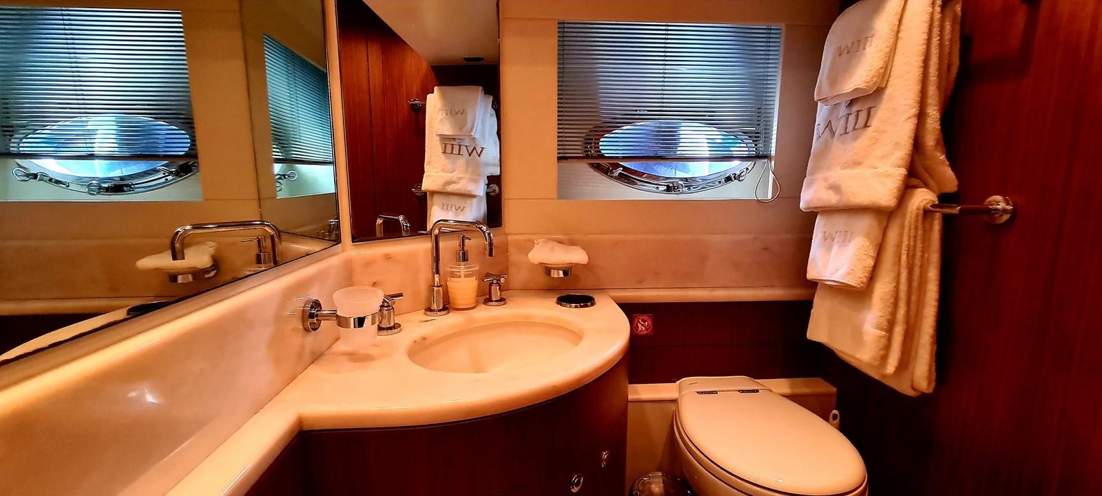 a bathroom with a sink and a toilet aboard RITAKI 7 Yacht for Sale