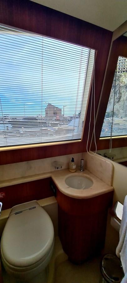 a bathroom with a sink and a toilet aboard RITAKI 7 Yacht for Sale